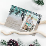 Mele Kalikimaka Beach Photo Holiday Card<br><div class="desc">Elegant hawaiian christmas card featuring a tropical ocean shoreline,  palm leaves,  string twinkle lights,  a family portrait picture,  the saying 'mele kalikimaka' drawn into the sand,  a personalized message,  and your name.</div>