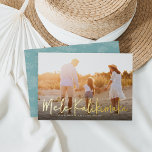 Mele Kalikimaka | Hawaiian Photo Foil Holiday Card<br><div class="desc">Chic full bleed horizontal or landscape-oriented holiday photo card features "Mele Kalikimaka, " the Hawaiian Christmas greeting, in casual gold foil hand lettered script typography as an overlay on your favourite beach or vacation photo. Personalize with your custom holiday message, the year, and your family name beneath. Cards reverse to...</div>