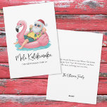 Mele Kalikimaka Santa Tropical Beach Christmas Holiday Card<br><div class="desc">Get into the holiday spirit with this fun and whimsical card featuring a cartoon Santa Claus relaxing in a bright pink flamingo floaty. Dressed in a festive Hawaiian shirt, red shorts, and his classic Santa hat, this laid-back Santa adds a playful twist to your holiday greetings. The floaty bobs in...</div>