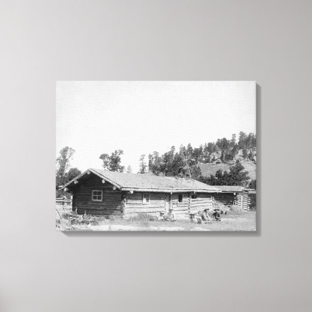 Men Sitting outside Log Cabin in South Dakota Canvas Print (Front)