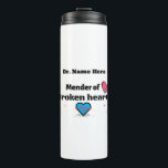 Mender of broken hearts thermal tumbler<br><div class="desc">Customizable thermal tumbler with saying, "Mender of broken hearts." Beautiful design with broken heart, needle and thread. Great gift for the doctor, counsellor, Pastor or therapist in the family, Dad's, Uncles, Sons or, to show appreciation for the nurse, doctor or heart sugeon who cared for you and helped you heal...</div>