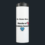 Mender of broken hearts thermal tumbler<br><div class="desc">Customizable thermal tumbler with saying, "Mender of broken hearts." Beautiful design with broken heart, needle and thread. Great gift for the doctor, counsellor, Pastor or therapist in the family, Dad's, Uncles, Sons or, to show appreciation for the nurse, doctor or heart sugeon who cared for you and helped you heal...</div>