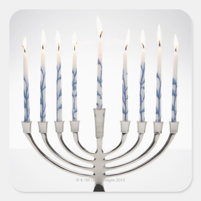 Menorah with burning candles square sticker (Front)