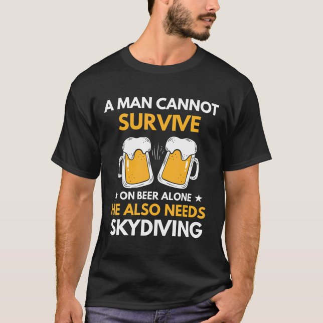 Mens A Man Cannot Survive On Beer Alone Funny Drin T-Shirt (Front)