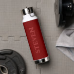Mens Modern Burgundy Personalized Gym Water Bottle<br><div class="desc">Stay hydrated in the gym with this Men's Modern Burgundy Personalized Gym Water Bottle.  It has a modern minimalist design with a dark red background and monochromatic bold typography name vertical on front centre.  Perfect gift idea for him during exercise and workout!  Click personalize template option and enter name.</div>