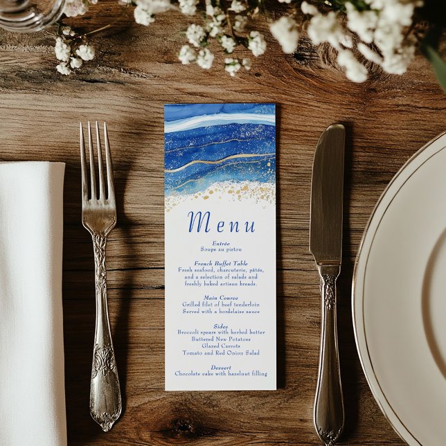 Menu Elégante aquarelle bleue et or (Wedding reception dinner menu with blue text and a top border of blue and gold splatters)