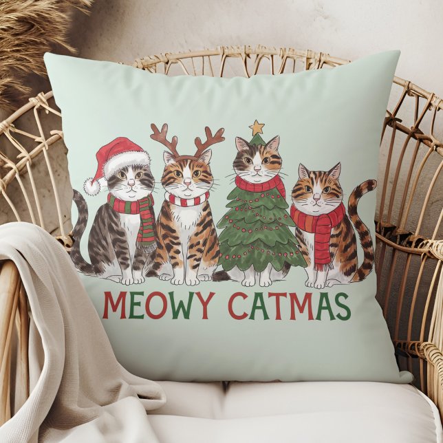 Meowy Catmas Funny Holiday Cats - Christmas Decor  Throw Pillow (Meowy Catmas Funny Holiday Cats - Christmas Decor Throw Pillow in a boho rattan armchair.)