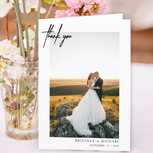 Merci blanc moderne à la main