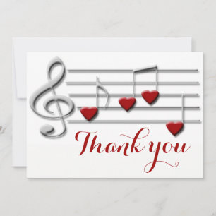 merci calligraphie sur les notes de musique cardia