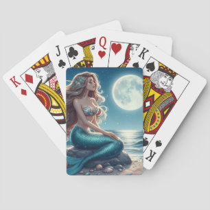 Mermaid on the beach at night playing cards