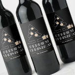 Merriest Christmas Black Wine Label<br><div class="desc">The words Merriest Christmas in retro vintage lettering,  a white sketch tree with faux gold foil ornaments and gifts are featured on these black wine bottle labels personalized with your family name. Stylish for any Christmas holiday occasion or give as a gifts. MATCHING items in our store.</div>