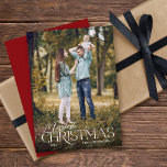 Merriest Christmas Elegant Script Photo Christmas Holiday Card<br><div class="desc">This simple full photo Christmas card features a blend of elegant serif and script text. The white text appears on top of the photo. Personalize with your name.</div>