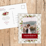 Merriest Christmas Winter Greenery Photo Holiday Postcard<br><div class="desc">Affordable custom printed holiday photo postcards with simple templates for customization. This festive design features an elegant watercolor floral border of holly leaves and flowers in red, green and burgundy colors on a neutral buffalo check plaid background. Personalize it with your photo and custom text. Postcard back has space for...</div>