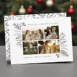 Merriest Christmas Wishes 4 Photo Botanical Floral Holiday Card<br><div class="desc">Merriest Christmas Wishes 4 Photo Botanical Floral Holiday Card Christmas Card features your favourite photo on the front with the text "Merriest Christmas Wishes" in modern silver calligraphy script typography on a white background and personalized with your family name below. On the reverse is an elegant gold botanical pattern. Perfect...</div>