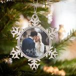 Merrily Ever After | Wedding Photo Snowflake Pewter Christmas Ornament<br><div class="desc">Festive holiday design features your favourite wedding photo with "merrily ever after" in a chic combo of white modern calligraphy script and block typefaces. Personalize with the year for a beautiful keepsake of your wedding.</div>