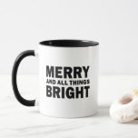 Merry and all Things Bright | Holiday Mug<br><div class="desc">Start your mornings with festive cheer! This ceramic coffee mug, as well as other drinkware in the collection, features the bold seasonal phrase “MERRY AND ALL THINGS BRIGHT” in crisp black lettering. A simple design while providing an elevated look. This design makes it a perfect companion for cozy winter sips,...</div>