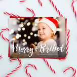 Merry and bribed funny Christmas photo red Holiday Card<br><div class="desc">Merry and bright? Maybe. But merry and bribed is more like it. This funny Christmas card with a play on words is perfect for sending lighthearted holiday greetings this season. Great for a photo of an ornery kid or pet, smiling siblings or the whole family posing together. The script white...</div>