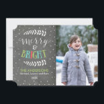 Merry and Bright Chalkboard Christmas Photo Card<br><div class="desc">Spread holiday cheer to your family and friends with a beautiful, modern Merry and Bright Christmas photo card. This unique photo card features a chalkboard background, white polka dot snowflakes, and colourful typography. You can personalize the card by changing the photo, family name, and the current year. Choose a different...</div>