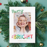 Merry and Bright Tissue Paper Christmas Photo Holiday Card<br><div class="desc">This fun, bright Christmas holiday card features colourful text, reading, "Merry & Bright" in green, lime, cherry red, pink, golden yellow, and aqua. The typography for the word "Bright" incorporates an overlapping tissue paper design, which is also included on the back (overlapping Christmas trees). The tissue paper has a crafty,...</div>