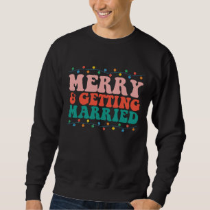 Merry And Getting Married Couple Christmas Groovy Sweatshirt