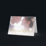 Merry and Married Gold Newlywed Elegant Holiday Card<br><div class="desc">Send out holiday cheer as a newlywed couple with this folded Christmas card featuring a modern and simple design with the message, "Merry and Married" in an elegant faux gold text over your favourite photo. Add your personal message to the inside or delete the text if you want to hand...</div>