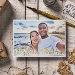 Merry Beachy Christmas fun vacation photo Foil Holiday Card<br><div class="desc">Share your favourite beach vacation picture with this fun and modern beach Christmas photo card featuring a trendy hand-lettered typography overlay that reads "Merry Beachy Christmas" decorated with waves, sun, and surfboard illustrations. Easily personalizable with one of your favourite holiday pictures and your names. The back of the card features...</div>