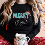 Merry Bright Blue Red Retro 80's Font Santa Hat T-Shirt<br><div class="desc">This cute,  girly Merry & Bright design was created using a fun modern script font and my hand lettered block font in a retro 80's style in aqua blue and red.  It features my hand painted Santa hat with holly and berries.</div>