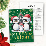 Merry Bright Fun Penguins Green Red Gold Christmas Foil Holiday Card<br><div class="desc">Create a stylish personalized Christmas card with a festive design that features a cute family of penguins in red Santa hats near a Christmas tree, golden yellow snowflakes and stars on a green background. This design has many real foil elements on the front side that makes this card unique and...</div>
