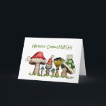Merry ChrisMUSH Christmas Mushrooms Cartoon Holiday Card<br><div class="desc">Six funny cartoon mushroom caps wearing holiday caps are saying Merry ChrisMUSH. Let these funny fungi express your Christmas or Holiday Cheer. Inside text can be edited and reads: Warmest Wishes, (from some cozy caps wearing caps) and Cappy New Year! There is a cute small mushroom on the 2nd page...</div>