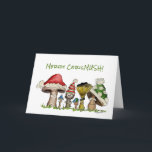 Merry ChrisMUSH Christmas Mushrooms Cartoon Holiday Card<br><div class="desc">Six funny cartoon mushroom caps wearing holiday caps are saying Merry ChrisMUSH. Let these funny fungi express your Christmas or Holiday Cheer. Inside text can be edited and reads: Warmest Wishes, (from some cozy caps wearing caps) and Cappy New Year! There is a cute small mushroom on the 2nd page...</div>