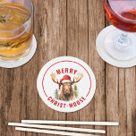 Merry Christ-moose Funny Christmas Moose Round Paper Coaster<br><div class="desc">Embrace the holiday spirit with our charming Christmas Coasters, featuring a lovable moose donning a Santa hat accompanied by the punny greeting “Merry Christ-moose”. This coaster is perfect for spreading laughter and joy during your holiday parties! The whimsical design and clever word play make it a unique and delightful addition...</div>
