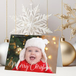 Merry Christmas Baby Photo Chic White Calligraphy Holiday Card<br><div class="desc">Elegant Merry Christmas photo folded card with beautiful cursive script in white. These modern holiday baby photograph horizontal cards feature gorgeous typography and your custom text over the full bleed picture in white at the top. Add a 2nd cute picture inside.</div>