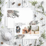 Merry Christmas Black Winter Pinecone Botanical Ho Holiday Card<br><div class="desc">Introducing our Merry Christmas Black Winter Pinecone Calligraphy Botanical Photo Holiday Card! This beautiful card features three of your favourite photos, perfectly arranged with a trendy, loose arrangement of botanical elements like pine cones and berries. The hand lettered calligraphy adds a touch of charm and elegance, making this the perfect...</div>