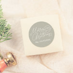 Merry Christmas Calligraphy Elegant Sage Green Classic Round Sticker<br><div class="desc">Add an elegant touch to your holiday gifts and cards with this boho green round “Merry Christmas” sticker. Featuring “Merry Christmas” in graceful script lettering with delicate flourishes, the year is nestled inside one of the swirling details and your family name is below. The boho soft sage green background gives...</div>