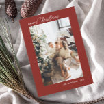 Merry Christmas Calligraphy Photo Red Holiday Card<br><div class="desc">**Personalized Minimalist Christmas Greeting Card** Celebrate the festive season with a touch of personal elegance. Introducing our minimalist Christmas greeting card, designed exclusively for those who appreciate simplicity with a hint of nostalgia. On the front, showcase your cherished photo, creating a sentimental focal point. Above your image, the phrase "Merry...</div>