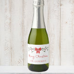 Merry Christmas Chic Coquette Red Bow Personalized Sparkling Wine Label<br><div class="desc">Celebrate the holidays in style with these customizable mini champagne bottle labels, featuring a festive red bow, elegant greenery, and personalized text. Perfect for Christmas party favours, holiday gifts, or adding a personal touch to your seasonal celebrations, these labels bring charm and sophistication to your holiday cheer. Ideal for family...</div>