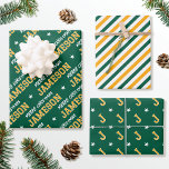 Merry Christmas Custom Name Monogram Green Gold Wrapping Paper Sheet<br><div class="desc">Elevate your gift giving this holiday season with a set of beautifully coordinated designs! Featuring three unique patterns in matching colours, that can be used individually or as a set. The first sheet is personalized with the recipient's name in classic block-style lettering. The 'Merry Christmas' phrase can also be customized...</div>
