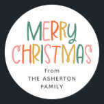 Merry Christmas cute fun colourful family name Classic Round Sticker<br><div class="desc">This fun colourful Christmas sticker features a playful Merry Christmas and room for your custom text. You can personalize this cute holiday gift sticker with who the gift is from or another message. Find more matching cards, gift wrap and more in a variety of colours and styles in the Fa...</div>