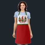 Merry Christmas Cute Red And Green Gnomes Apron<br><div class="desc">Spread the holiday cheer with this festive apron! It makes a great gift for any Christmas lover or cooking enthusiast. Add a touch of festive fun to your kitchen with this adorable Christmas apron featuring three jolly gnomes. These charming gnomes, dressed in their holiday best, are sure to bring smiles...</div>