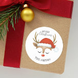 Merry Christmas Cute Reindeer Classic Round Sticke Classic Round Sticker<br><div class="desc">A cute reindeer face with a santa hat decorates this sticker with the words Merry Christmas. Fun for decorating Christmas gifts and holiday treat bags for neighbours. Personalize it with your name. Designed for you by Blackberry Boulevard.</div>