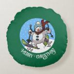 Merry Christmas! Editable Text Skiing Snowman Round Pillow<br><div class="desc">Make somebody's home cosy and festive this Christmas with a round pillow or cushion, featuring a cartoon of a jolly snowman with a carrot nose and coal eyes, dashing through the snow on skis, in woolly winter hat and tartan scarf. Use "Personalise this template" to change the "Merry Christmas!" text...</div>