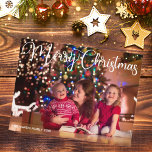 Merry Christmas Elegant White Script Overlay Photo Postcard<br><div class="desc">Elegant Merry Christmas photo postcard with beautiful cursive typography in white. This modern holiday family photograph postcard features gorgeous script and your name in white over the full bleed picture. Festive,  minimalist holiday postcard.</div>