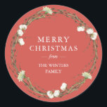 Merry Christmas Family Name Winter Greenery Red Classic Round Sticker<br><div class="desc">Merry Christmas sticker with your family name in elegant modern typography and a classic stylish winter greenery wreath with cotton sprigs and white floral on a vintage red background. Simply add your name. Exclusively designed for you by Happy Dolphin Studio. If you need any help or matching products please contact...</div>