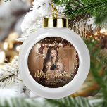 Merry Christmas Family Photo Elegant Gold Script Ceramic Ball Christmas Ornament<br><div class="desc">Spread holiday cheer to friends and family with this modern keepsake ornament. The gold faux foil text reads "Merry Christmas" in elegant handwriting script. Replace the sample image with your favourite photo,  and add your family name and the year. A black gradient filter helps make the text pop.</div>