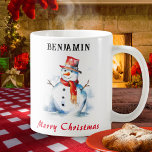 Merry Christmas Festive Personalized Snowman Coffee Mug<br><div class="desc">Relax and enjoy your favourite hot drinks in your own personalized Christmas mug. The festive mug features a watercolor-style picture of a cheerful snowman, with 'Merry Christmas' greeting in red script typography. Full of winter charm, the snowman mug makes a fun holiday gift, as a stocking stuffer, secret Santa gift,...</div>