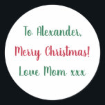 Merry Christmas from Mom Red and Green Classic Round Sticker<br><div class="desc">This is a Christmas gift tag label in festive red and green. It has the message Merry Christmas Love Mom xxx in stylish typography script. To personalize, simply change the name Alexander to your loved one's name in the personalize this text box. Want to make more changes? All of the...</div>