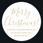 Merry Christmas gold white script return address Classic Round Sticker<br><div class="desc">Merry Christmas gold and white modern custom script calligraphy name and address personalized Christmas return address stickers.
Fully customizable faux gold text,  white background.
Elegant,  simple,  modern design.</div>