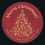 Merry Christmas! Golden Lights Tree on Crimson Red Classic Round Sticker<br><div class="desc">These beautiful Christmas stickers feature a beautiful design that is at once traditional and modern. There is a Christmas tree made completely of gold lights on a marbled crimson red background. The caption reads Merry Christmas, and there is space below for a short note or signature. Perfect as envelope seals...</div>
