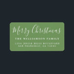 Merry Christmas Green White Return Address Label<br><div class="desc">Add some extra cheer to your holiday cards and invitations with our festive Merry Christmas return address labels. This stylish Christmas design features 'Merry Christmas' in white handwritten chic script calligraphy on a meadow green background. Simply add your name and address. Exclusively designed for you by Happy Dolphin Studio. If...</div>