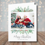 Merry Christmas Greenery Traditional Photo Holiday Card<br><div class="desc">A simple and classic Christmas card look with greenery like evergreen branches, leaves, and more surround a single photo of your family or whatever you want to include. Subtle hints and pops of colour from the red holly berries give it a little something extra. In centre is 'Merry Christmas' in...</div>